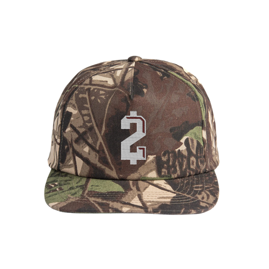 Camo snapback hat featuring raised $2 embroidery on front, adjustable back, and rugged outdoor style, official Johnny Manziel merch.